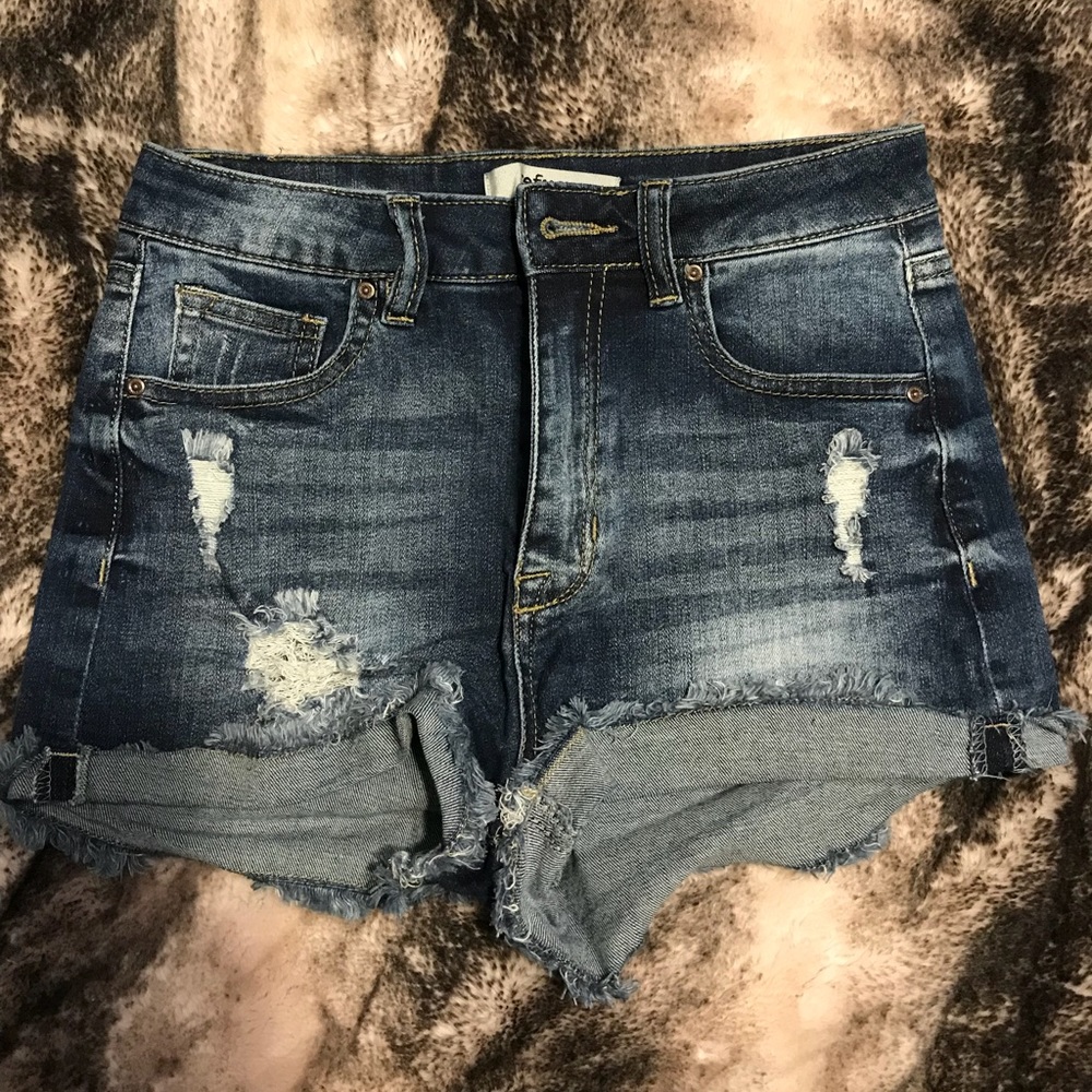 Distressed dark denim shorts